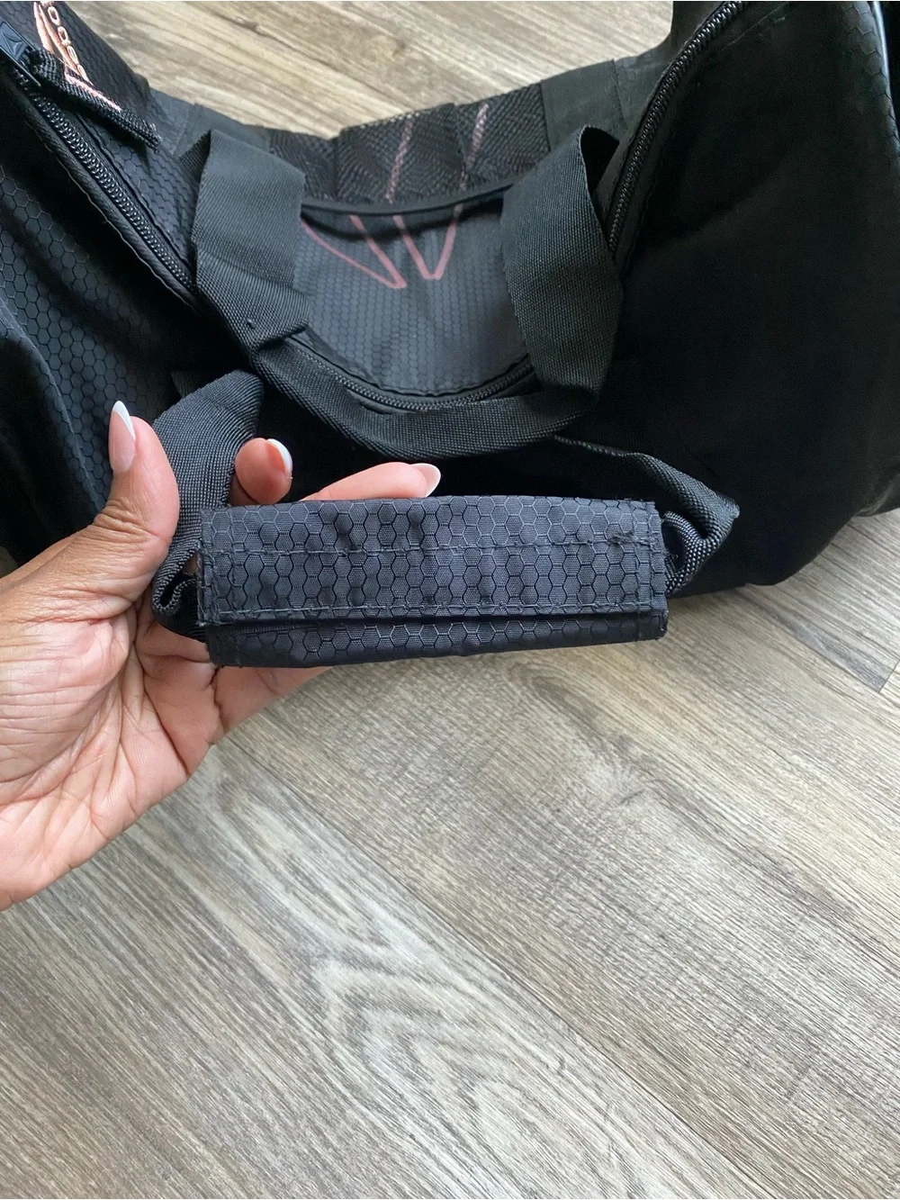 Reebok Women’s Black Duffel Bag with Subtle Rose Accents